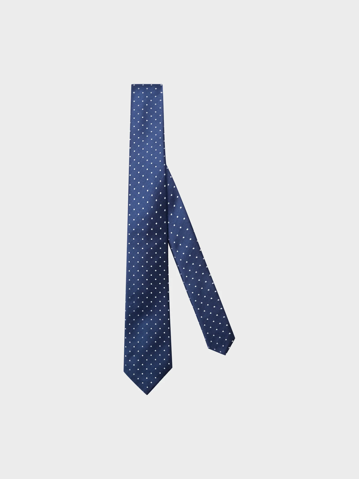 Cravatta sette pieghe in seta jacquard blu con pois bianchi